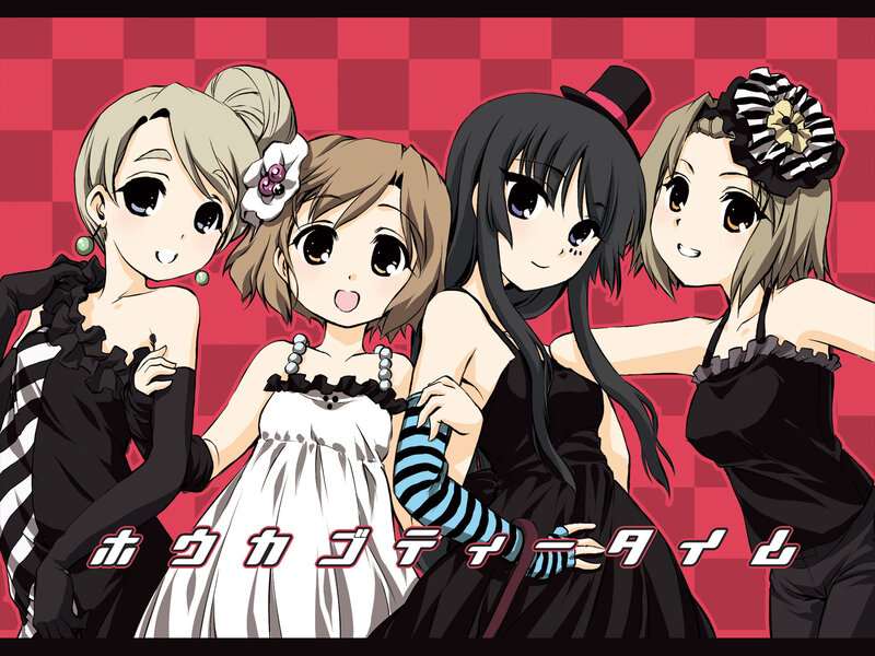 Four girls in party dresses