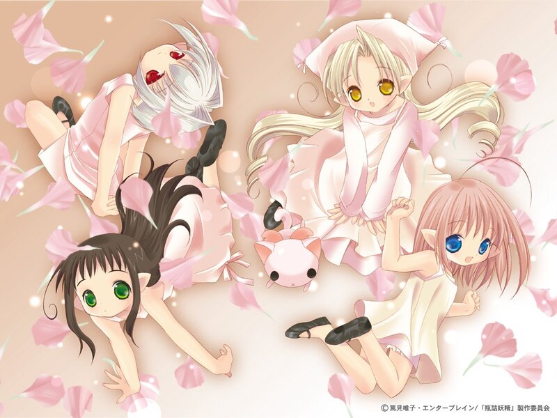 Four girls in pink dresses