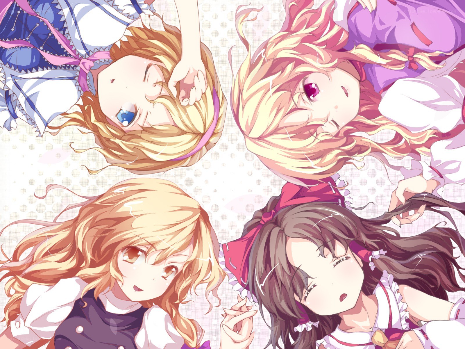four girls lying down