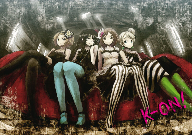 Four girls on a red couch