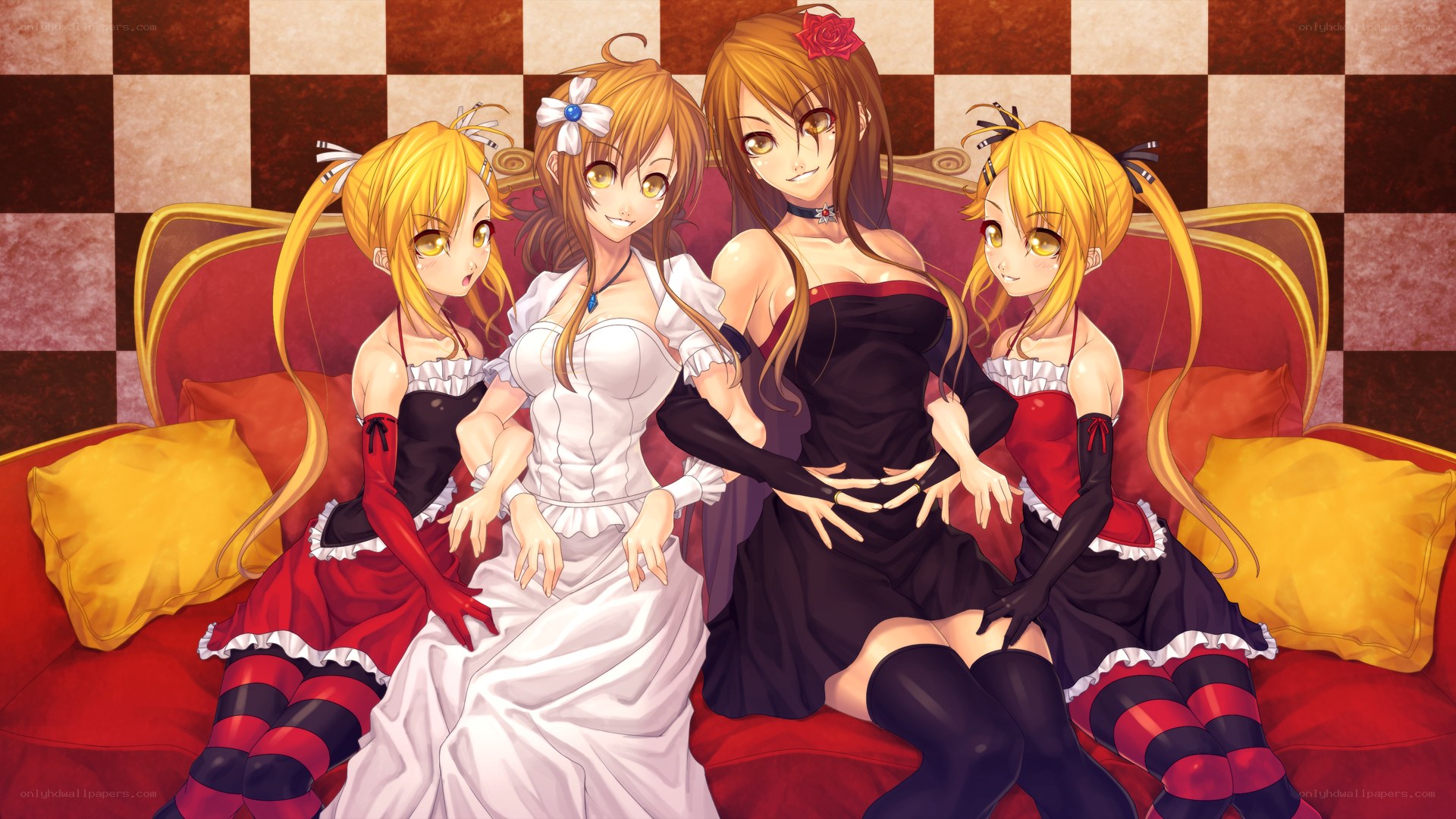 Four girls on a red couch