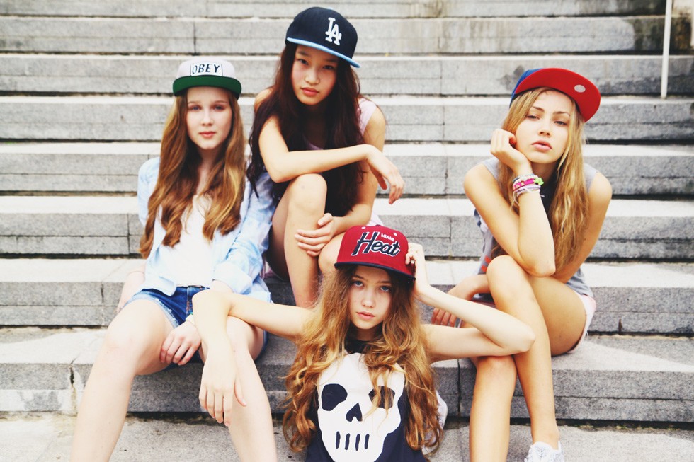 four girls on steps