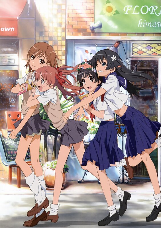 Four girls running in the street