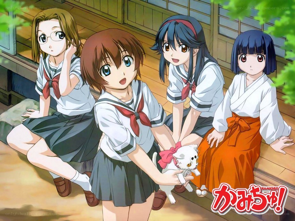 Four girls with a kitten