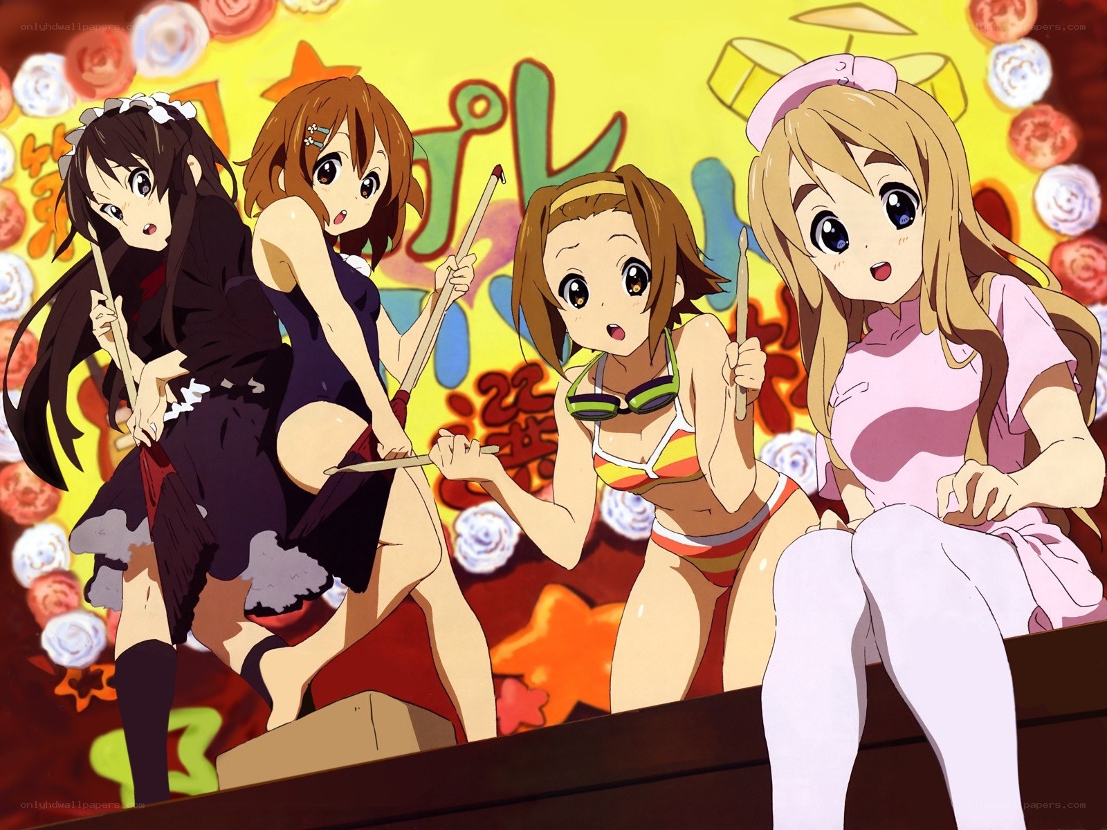 Four girls with drumsticks