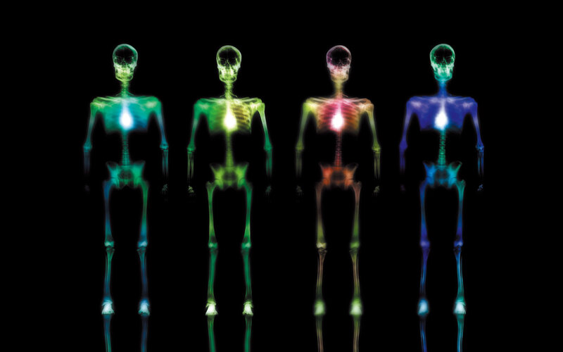 Four glowing skeletons