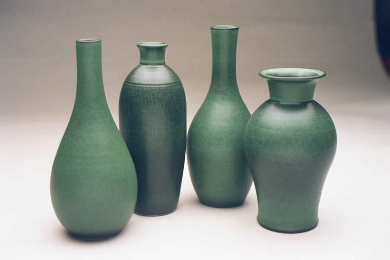 Four Green Vases