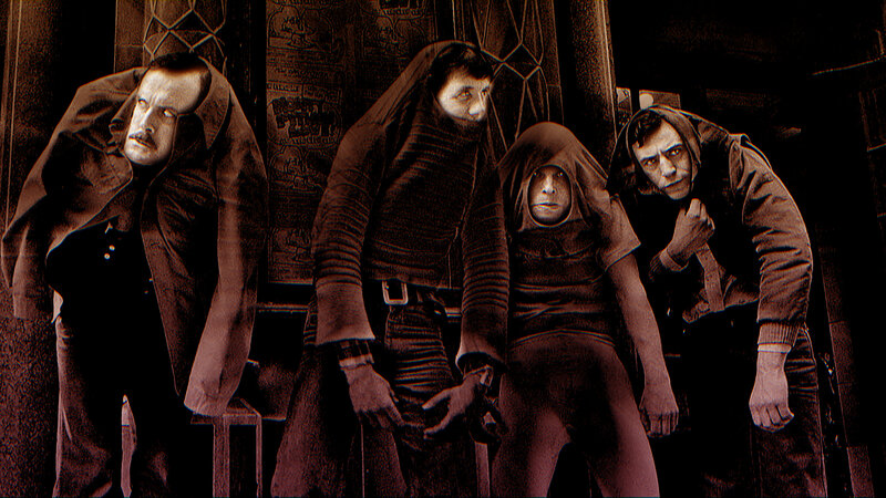 Four Hooded Figures