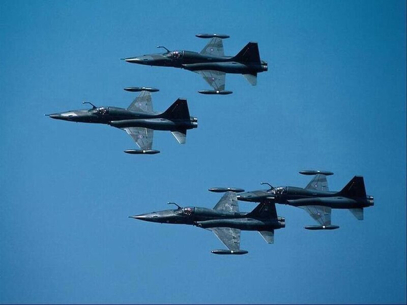 Four Jet Fighters in Formation — Blue