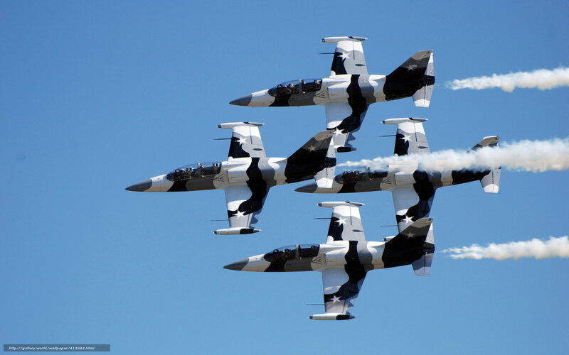 Four Jets in Formation — Blue, Dynamic, Afternoon, Photograph