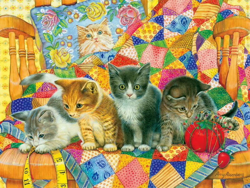 Four Kittens on Quilt