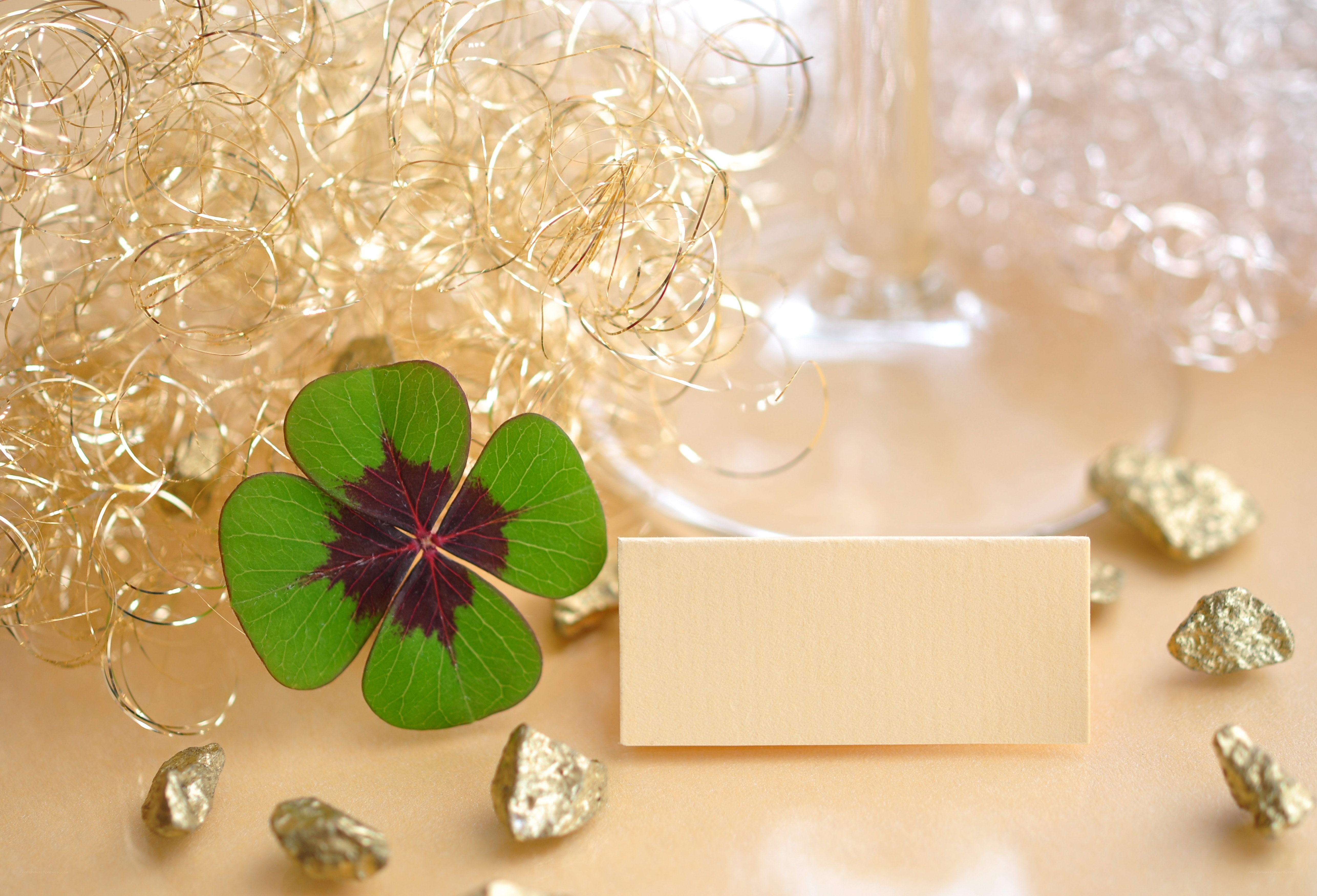 Four-leaf clover with gold accents