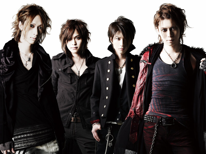 four male band members in dark fashion