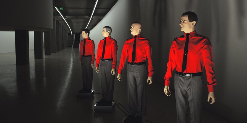 Four Mannequins in Red Shirts