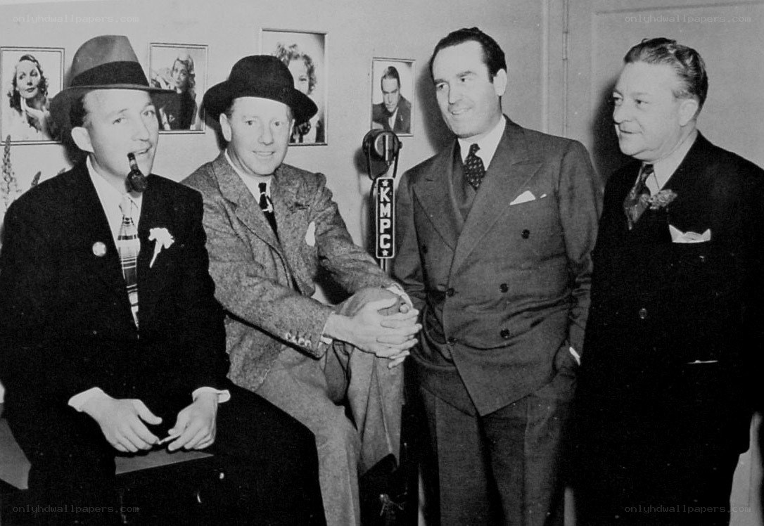 Four men at a radio studio