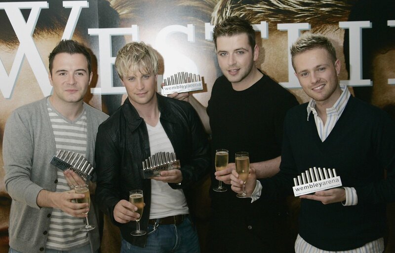 Four Men Holding Awards — Black