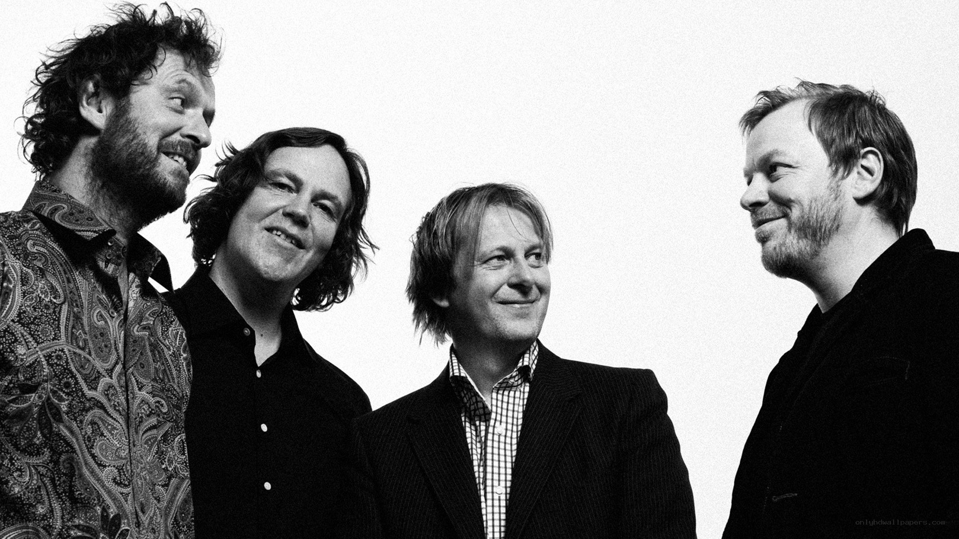 four men in a band