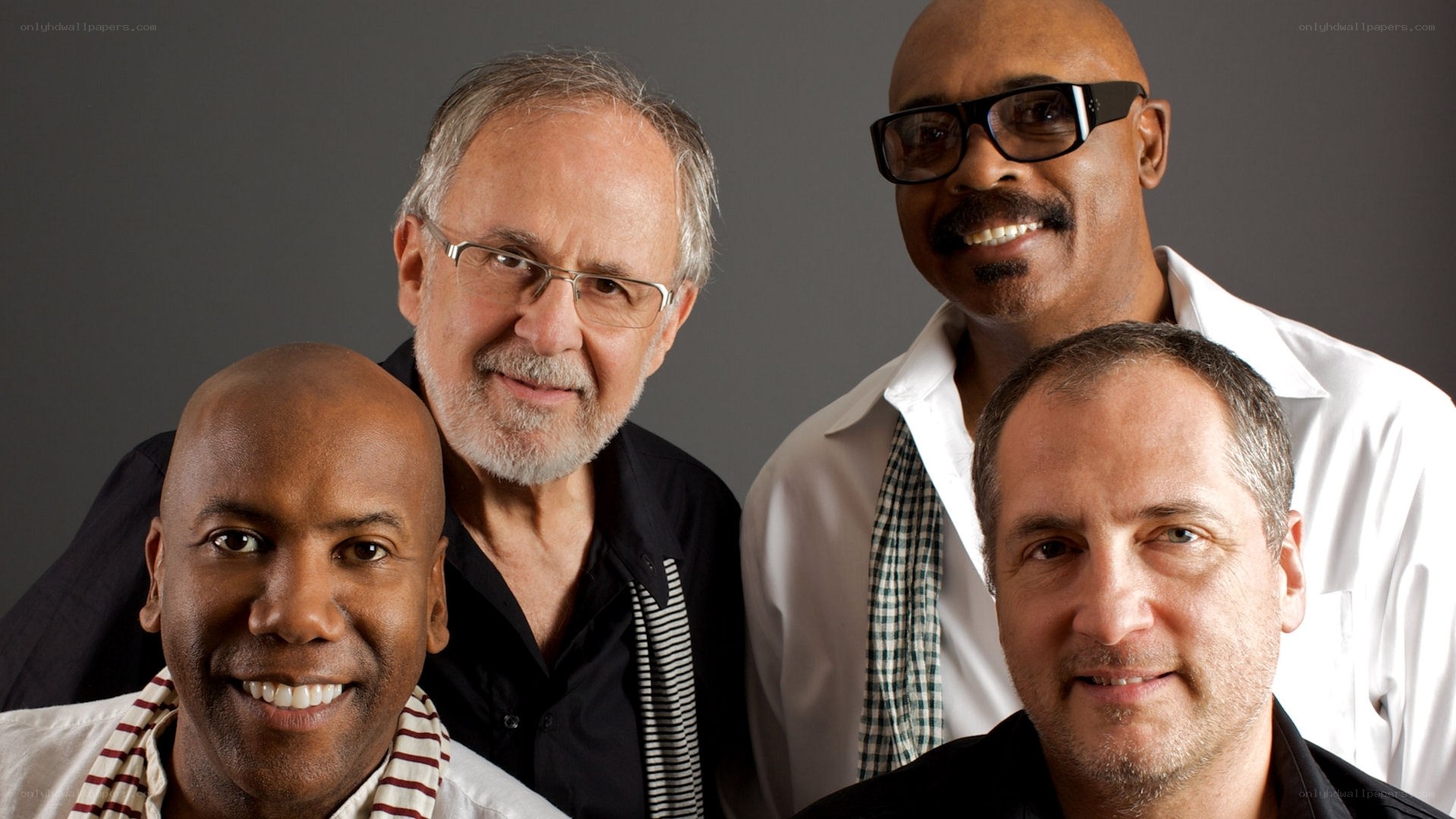 four men in a group portrait