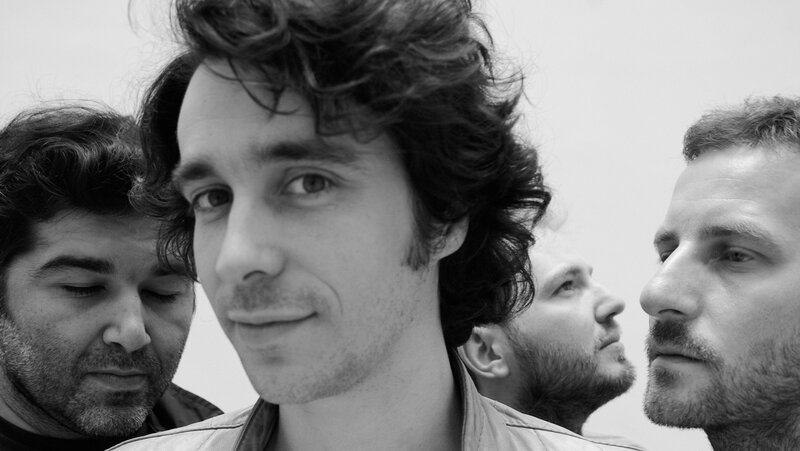 four men in a group