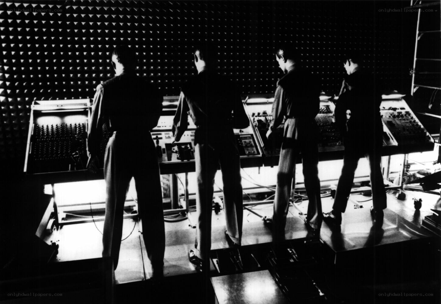 Four men in a recording studio