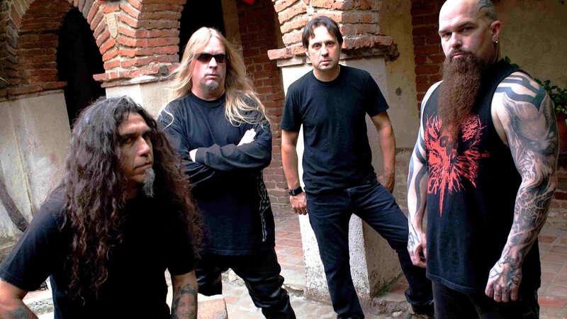 Four Men in Band — Black, Serious, Photograph, Brick Wall, Tattoos
