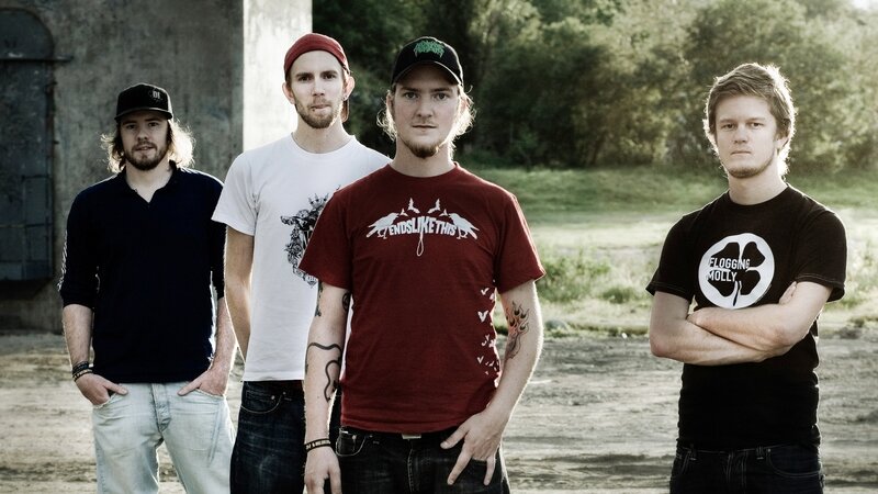 Four Men in Band T-shirts