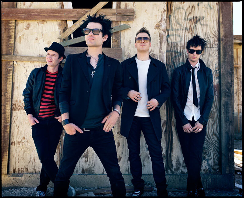 Four Men in Black Clothing — Confident