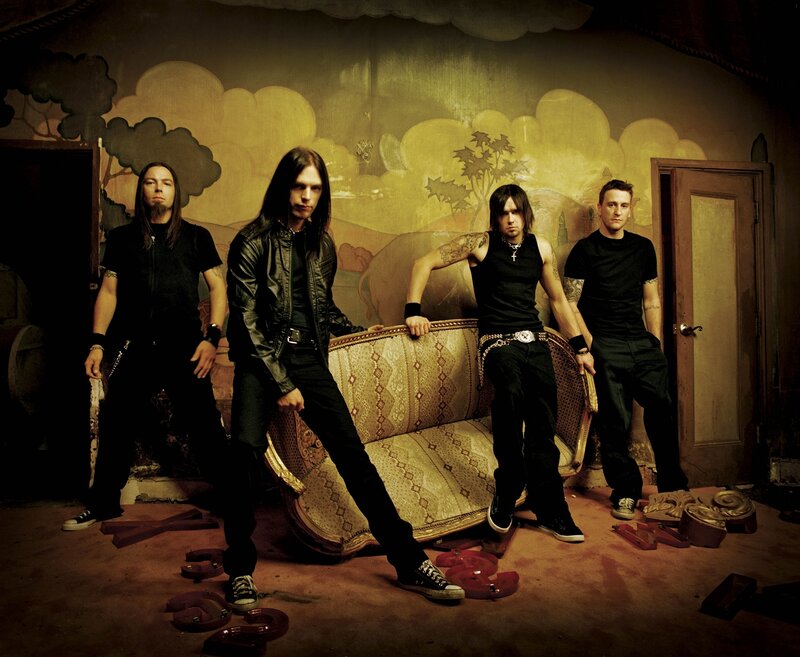 Four Men in Black Clothing — Dramatic, Photograph, Couch