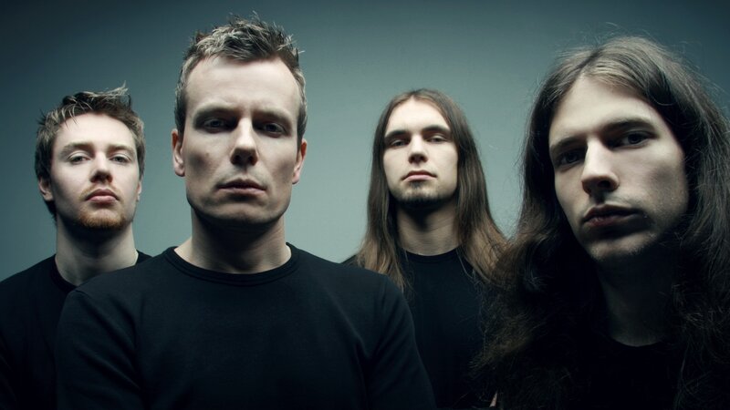 Four Men in Black Shirts — Serious, Photograph, Hair