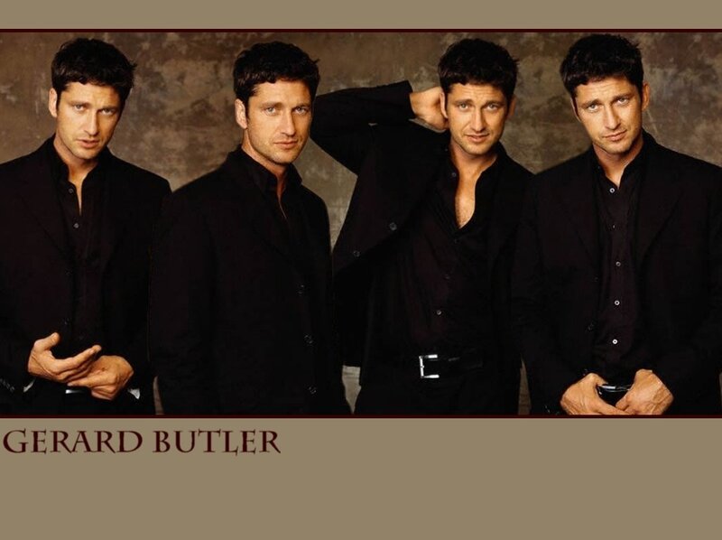 Four Men in Black Suits
