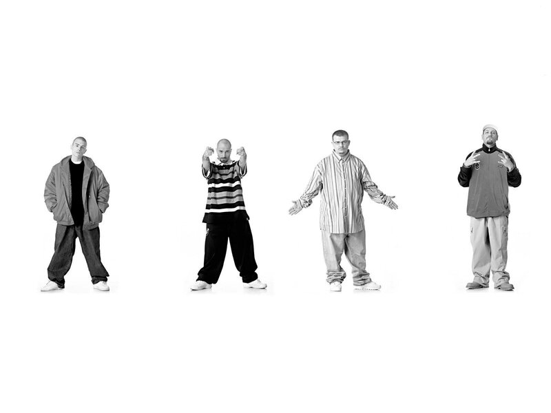Four Men in Casual Clothes