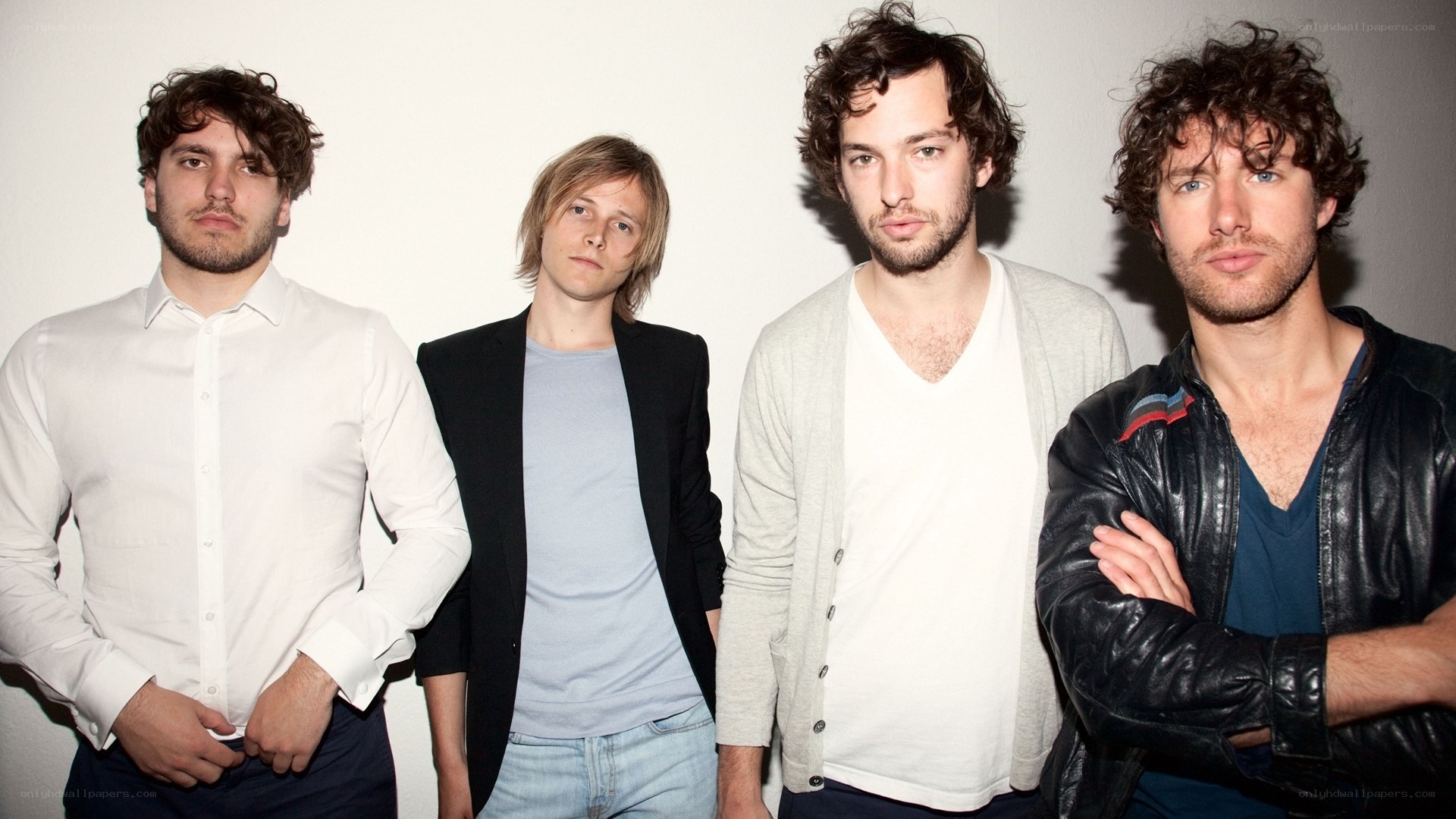 four men in casual clothing