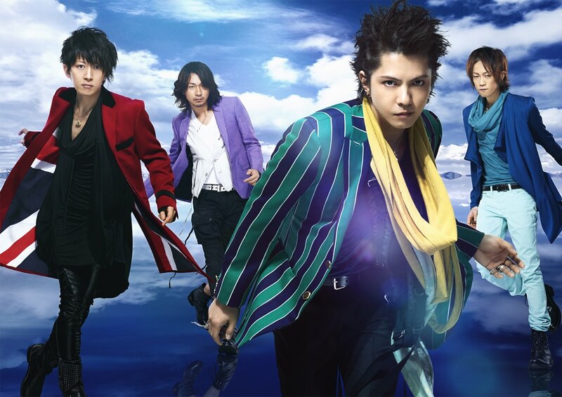 Four Men in Colorful Suits