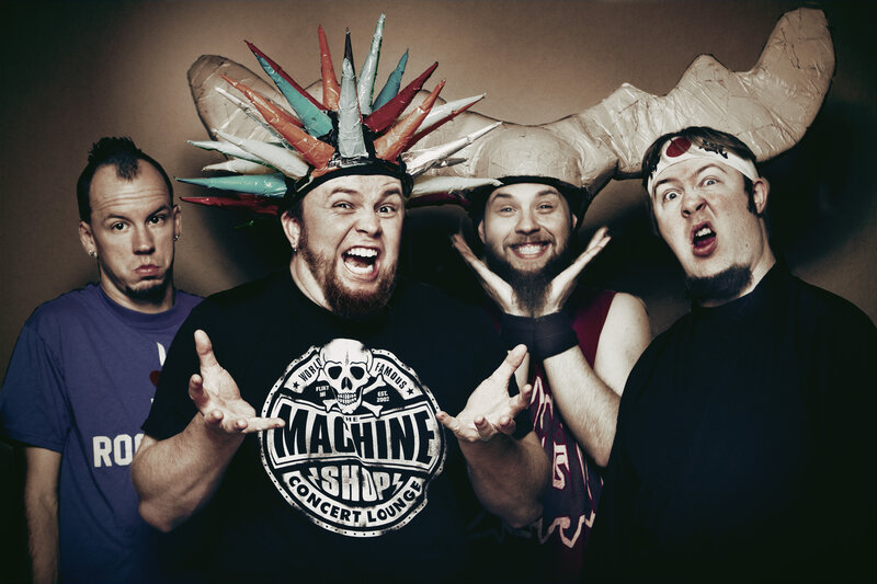 Four Men in Costumes
