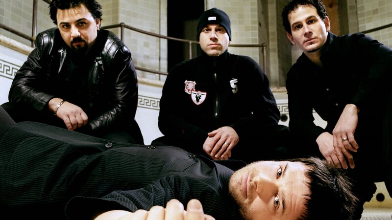 Four Men in Dark Clothing — Black, Dramatic, Photograph, Jacket