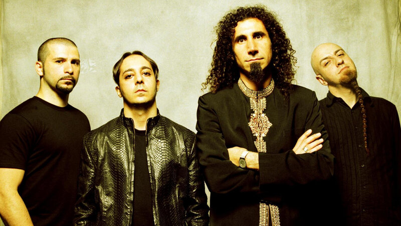 Four Men in Dark Clothing — Black, Serious, Photograph, Curly Hair, Beard