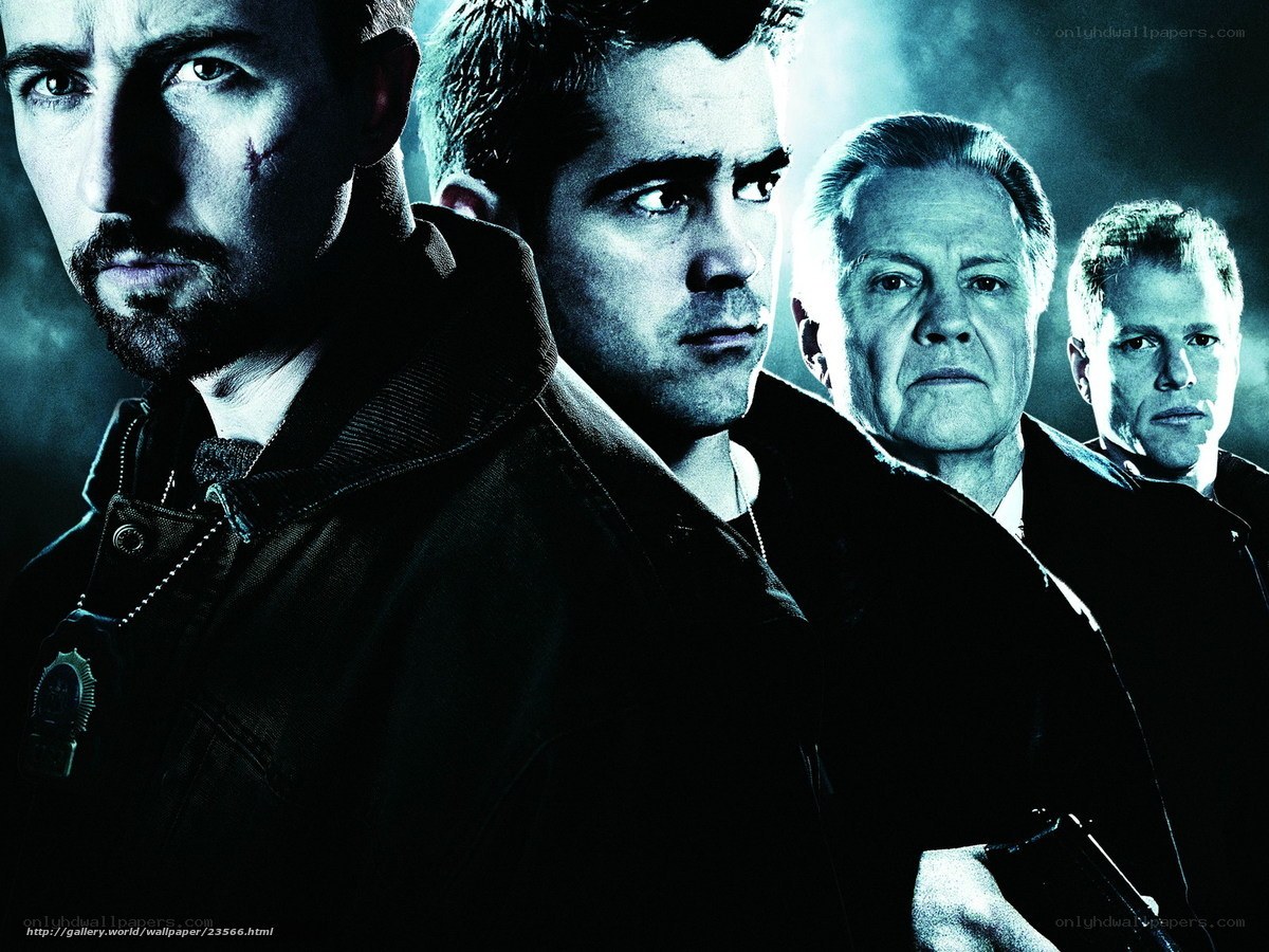 four men in dark coats