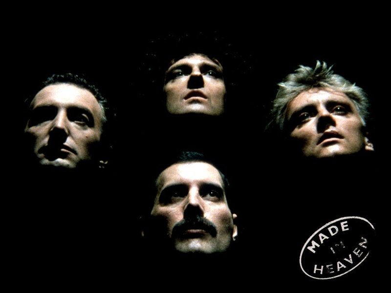 Four Men in Dark Setting
