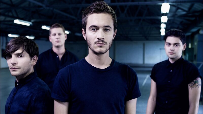 Four Men in Dark Shirts