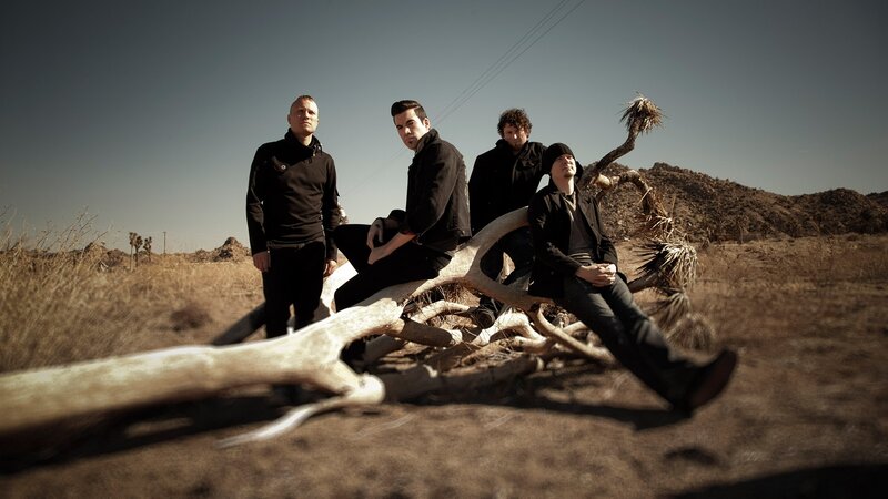 Four Men in Desert — Brown, Dramatic, Afternoon