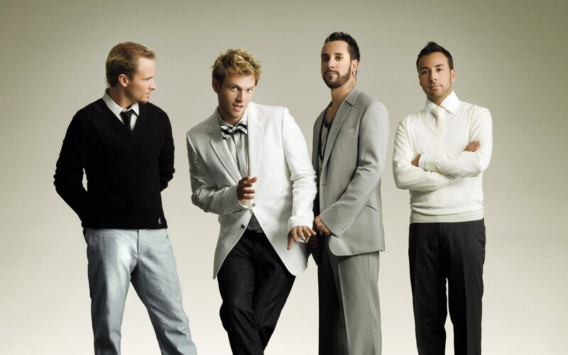 four men in formal wear