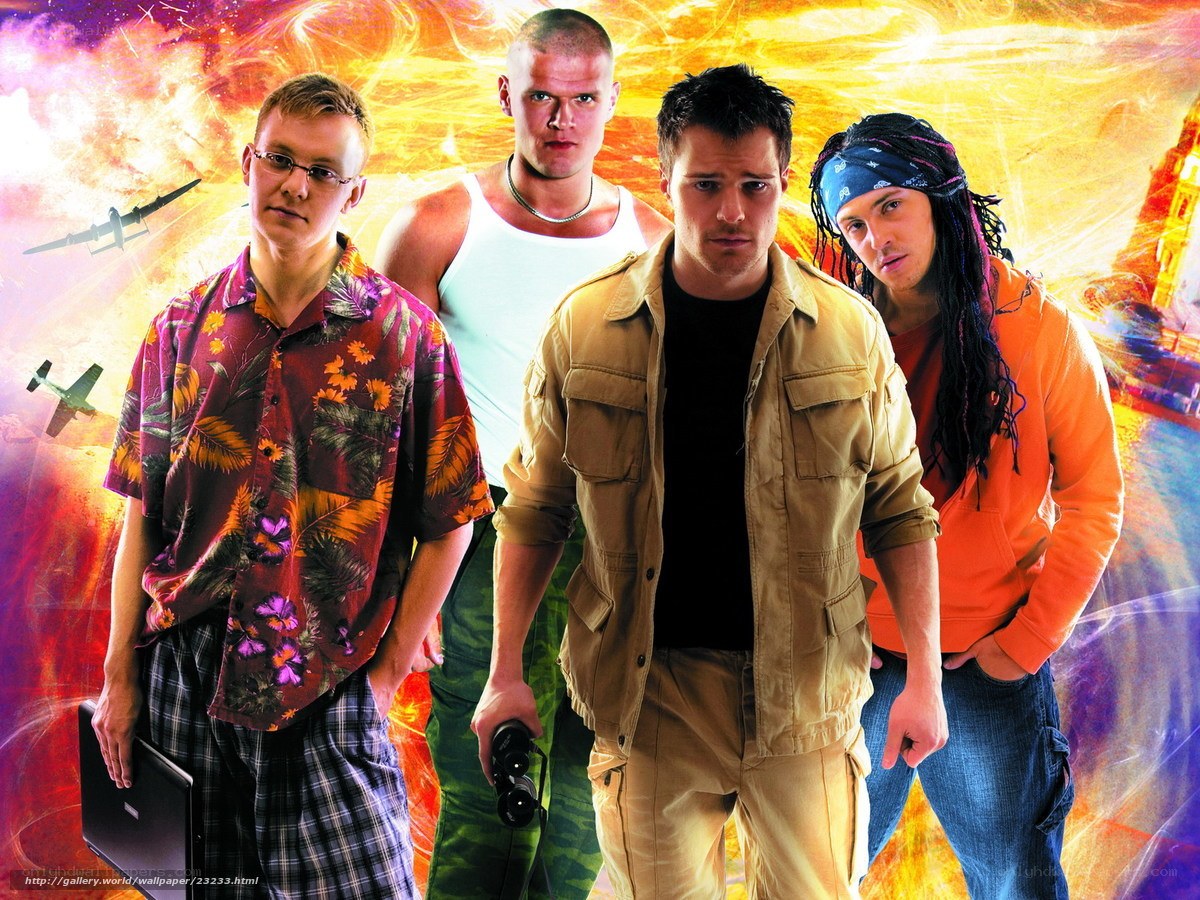 Four men in front of explosive background