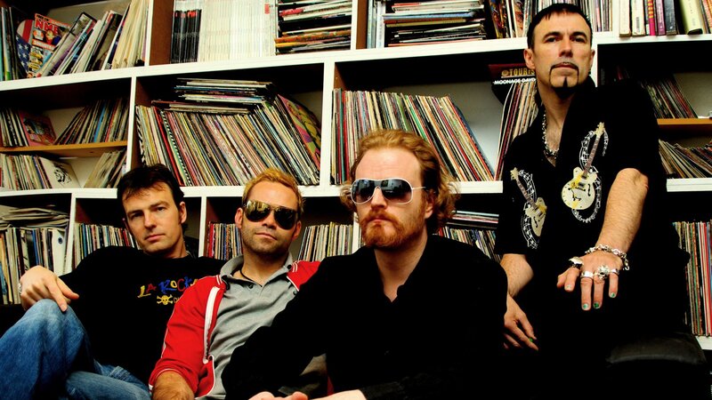 Four Men in Front of Records