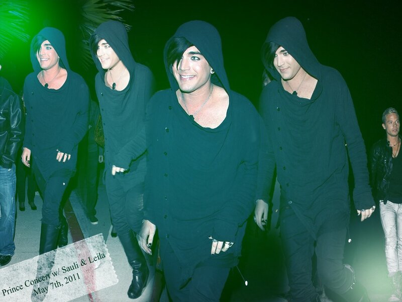Four Men in Hooded Outfits