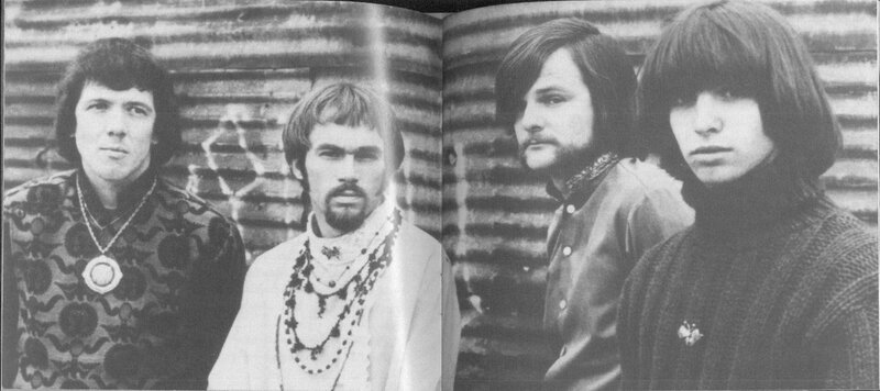 Four Men in Patterned Clothing