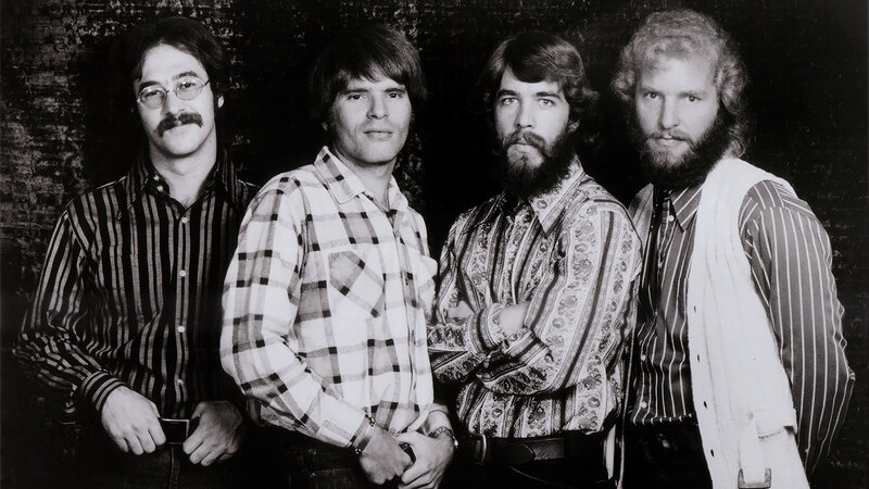 Four Men in Patterned Shirts — Black