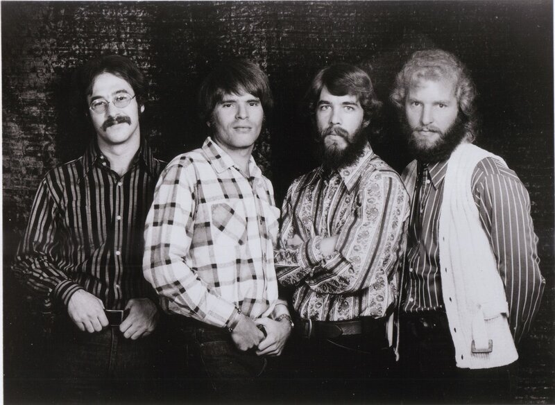 Four Men in Patterned Shirts