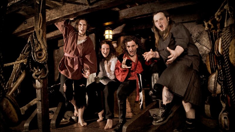Four Men in Pirate Costumes — Brown