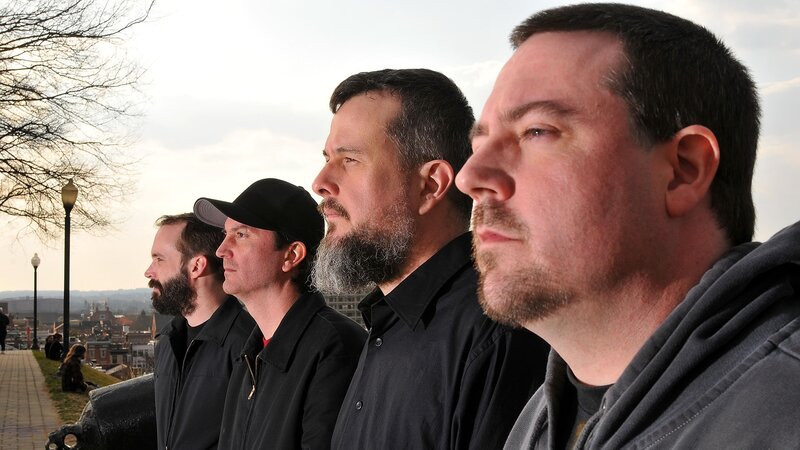 Four Men in Profile — Black