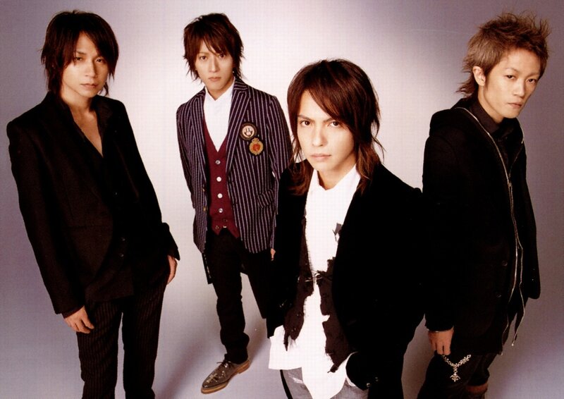 Four Men in Stylish Clothing — Black